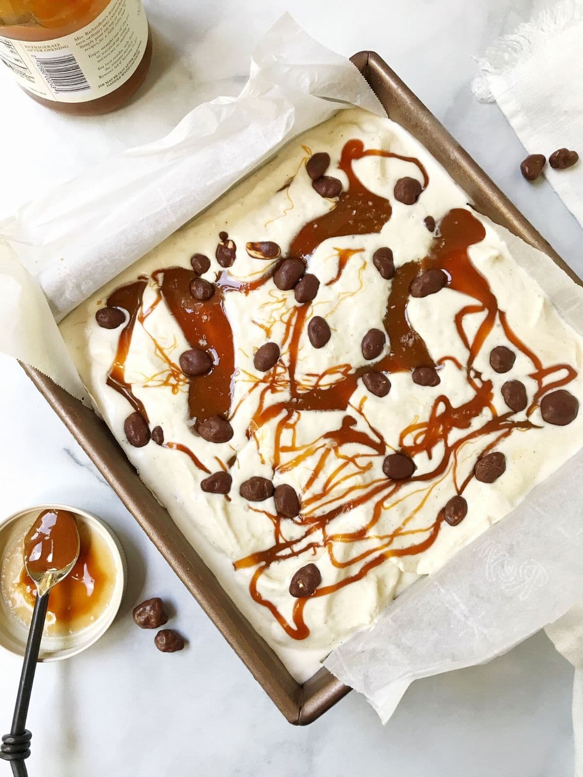 pan of caramel swirled vanilla ice cream