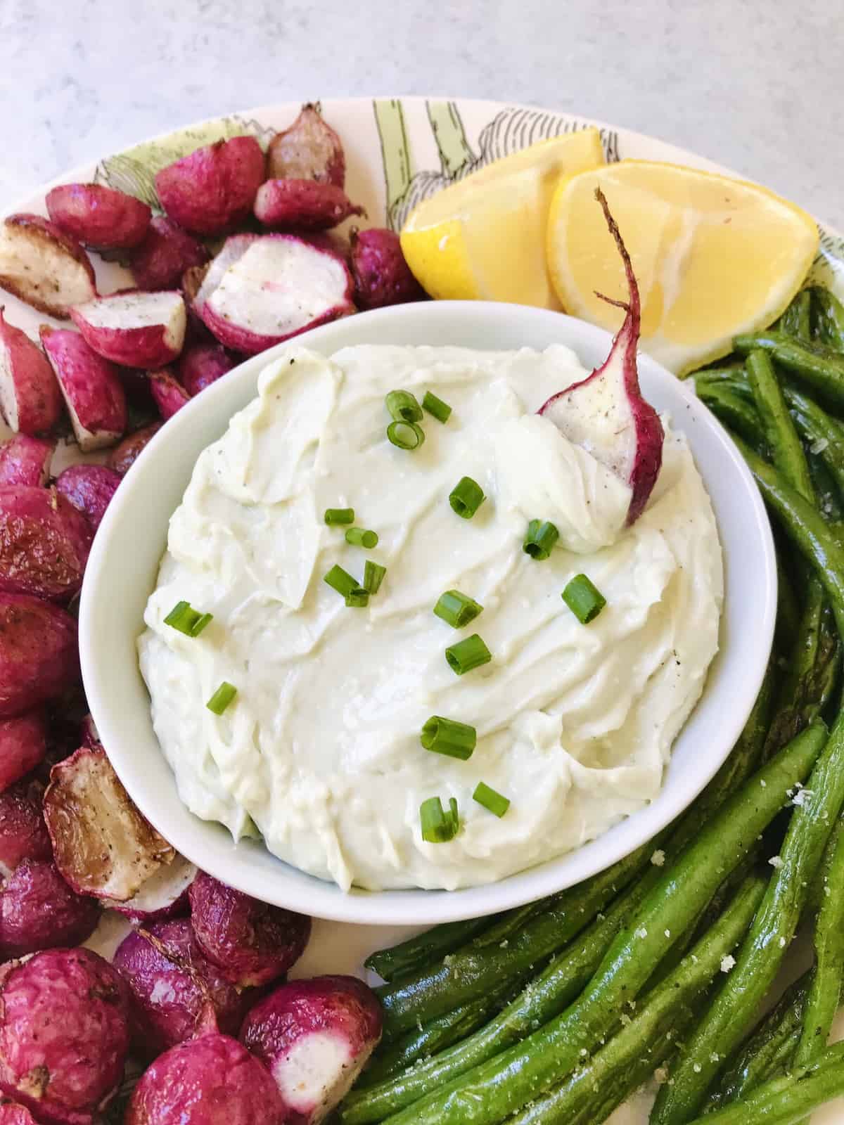 close up of blue cheese butter with veggies