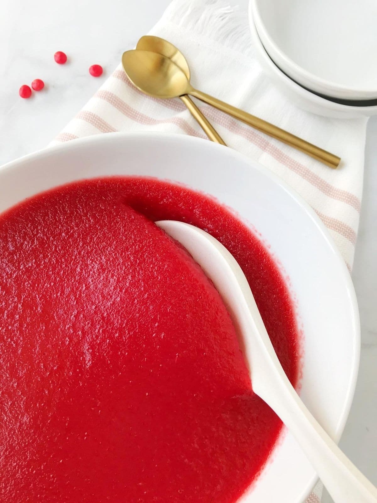 serving spoon in bowl of jello