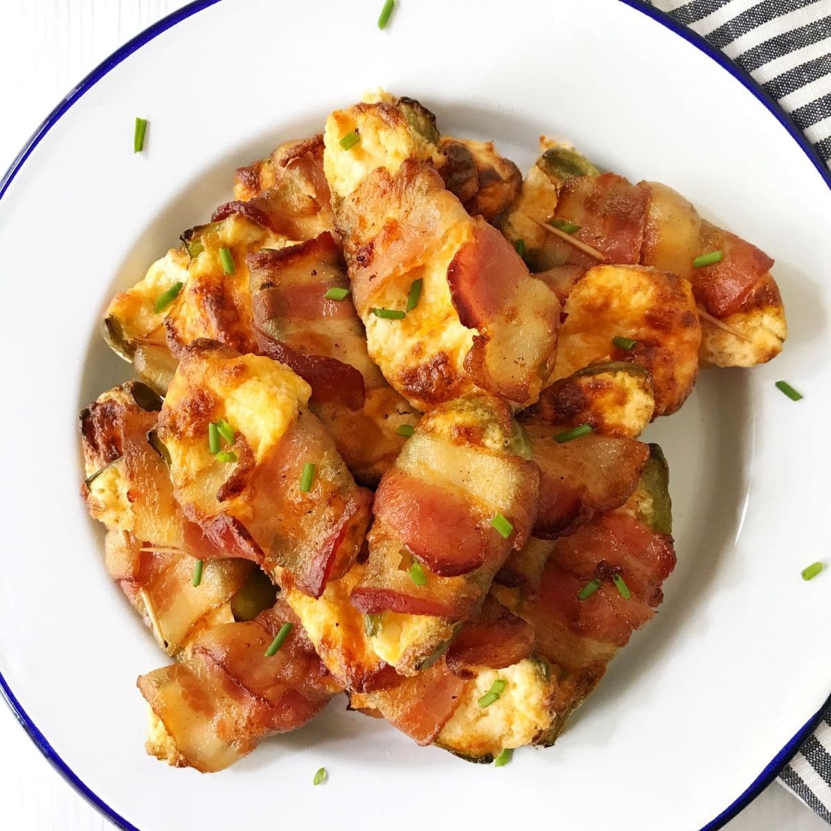 jalapeno poppers piled on a plate