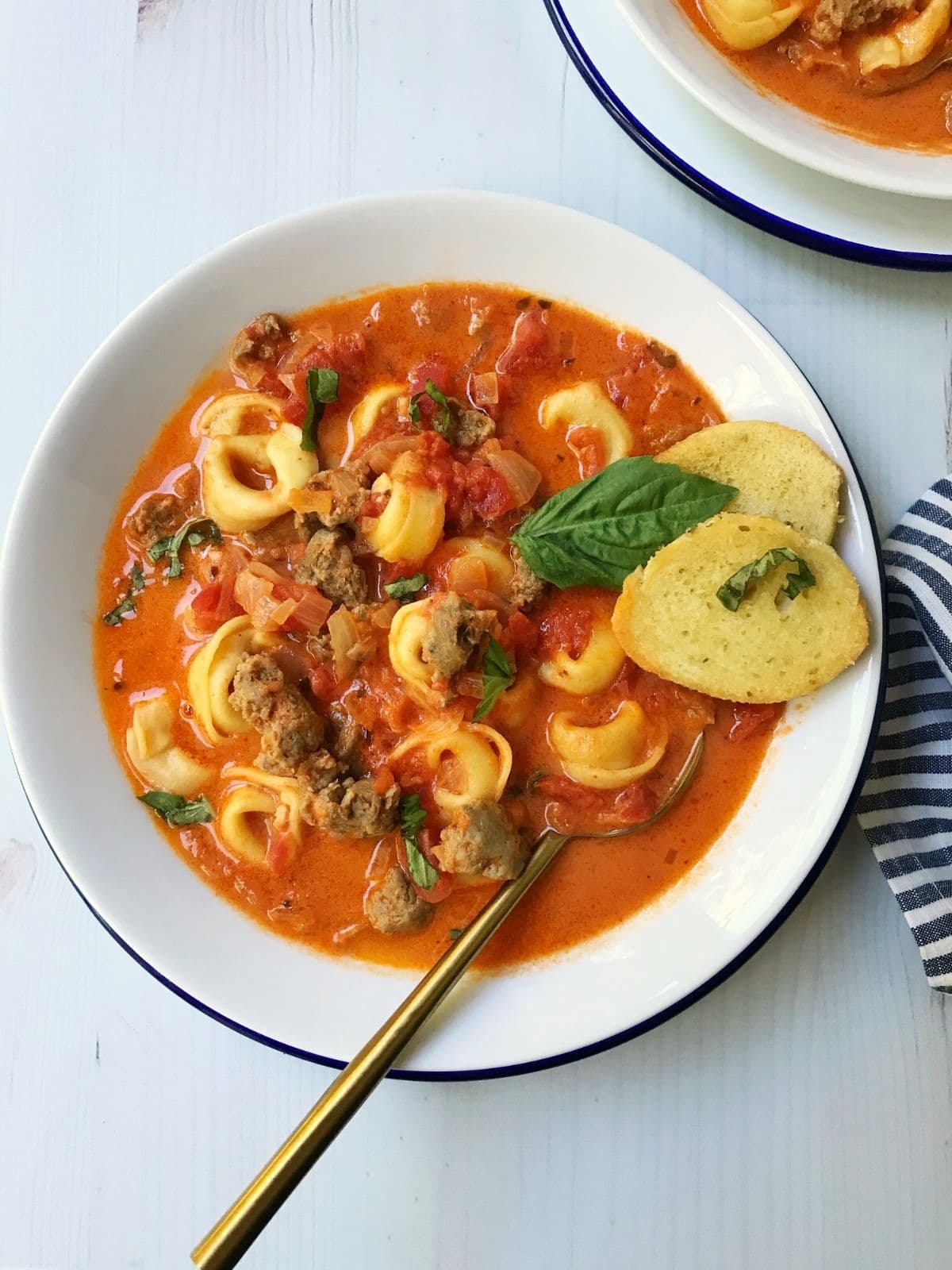 spoon in a bowl of soup