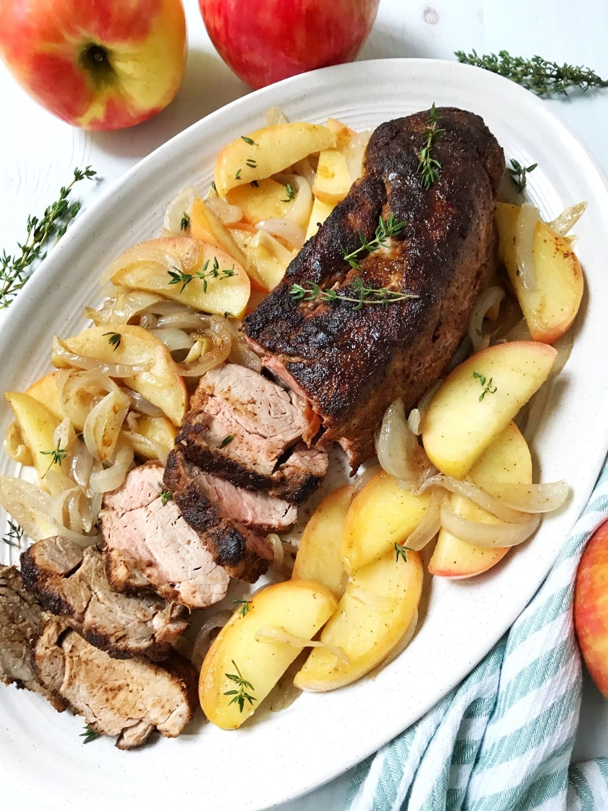 sliced tenderloin with onions and apples