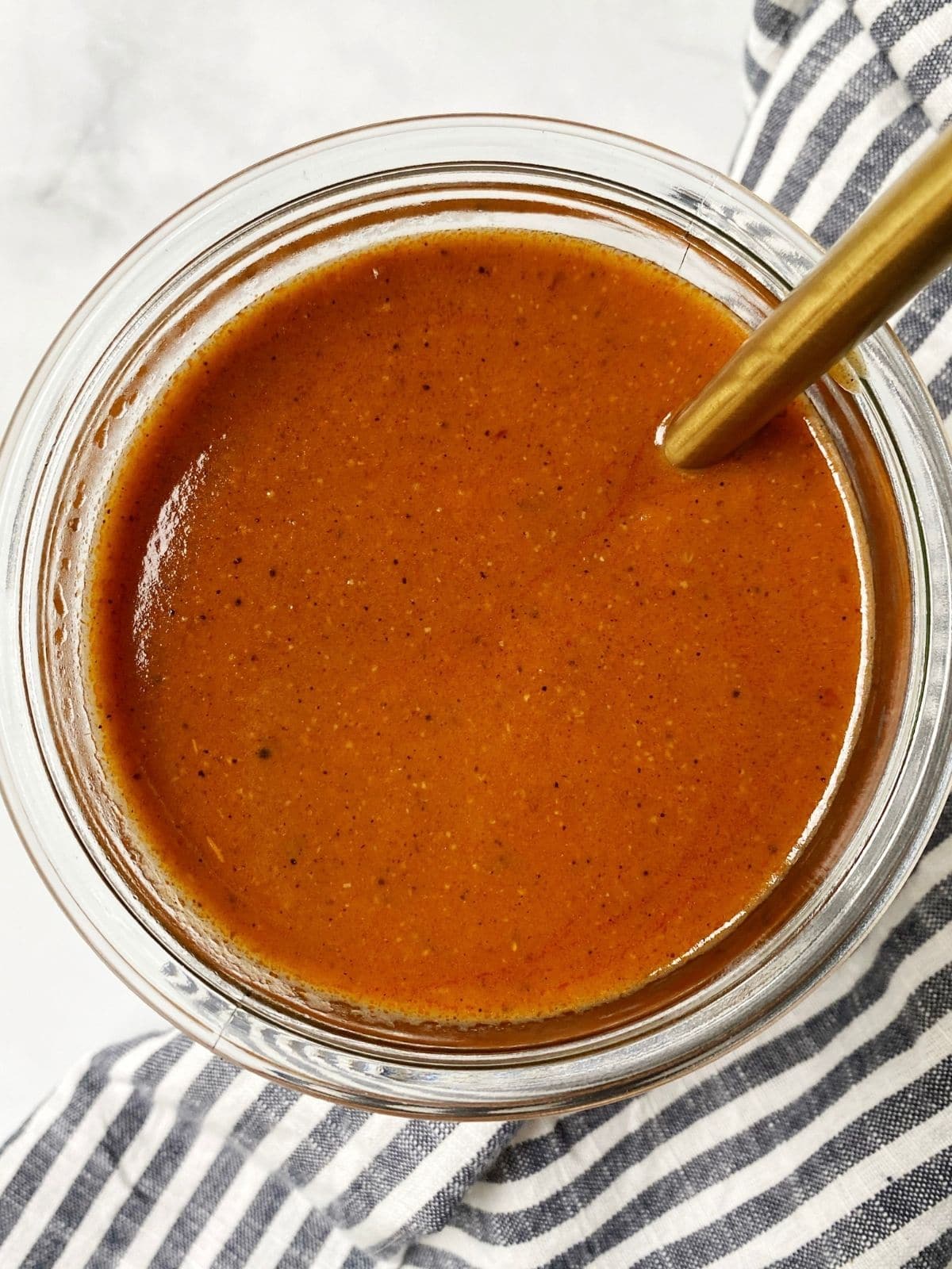 enchilada sauce in a glass jar