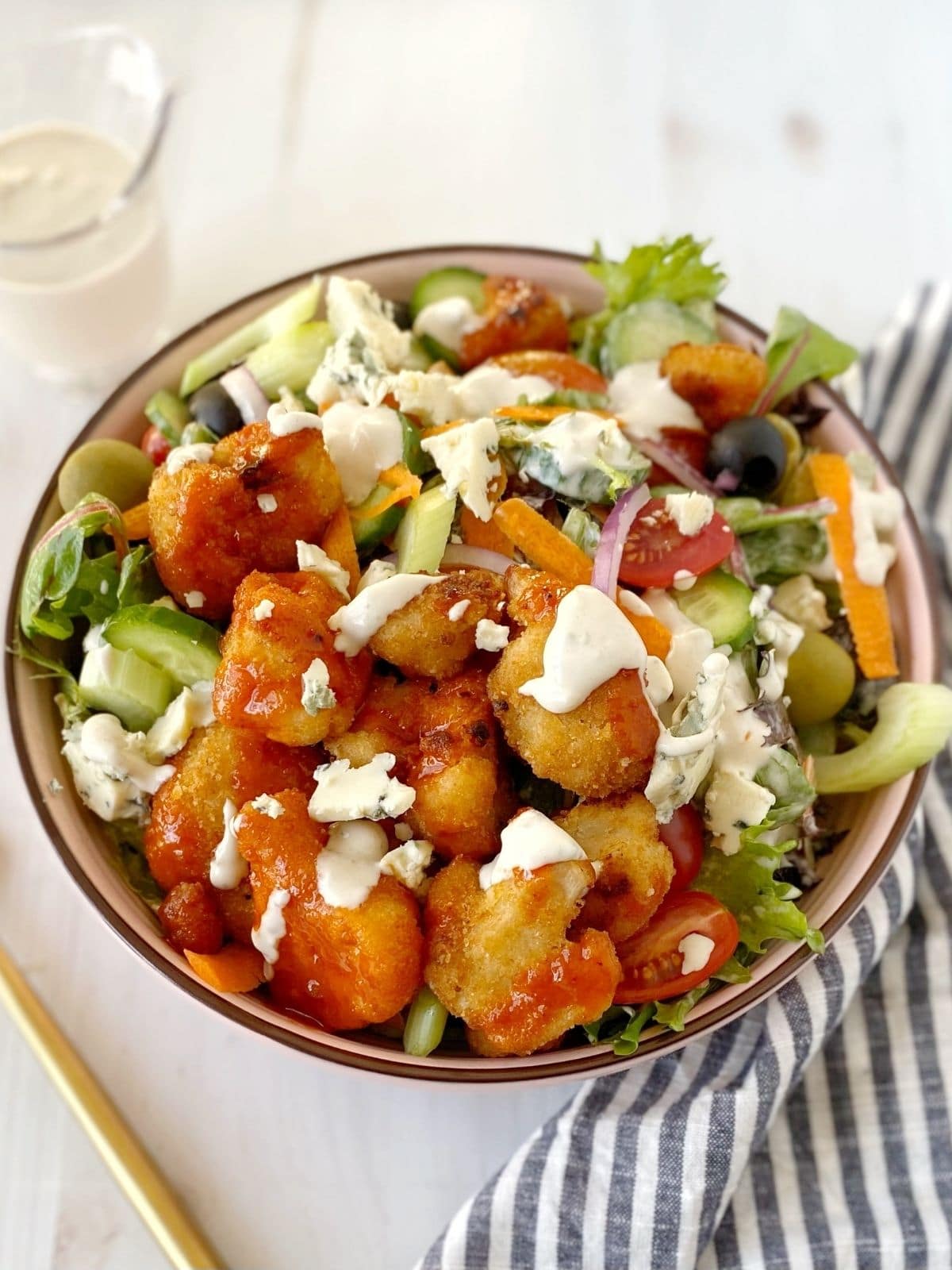 bowl of salad with crispy cauliflower