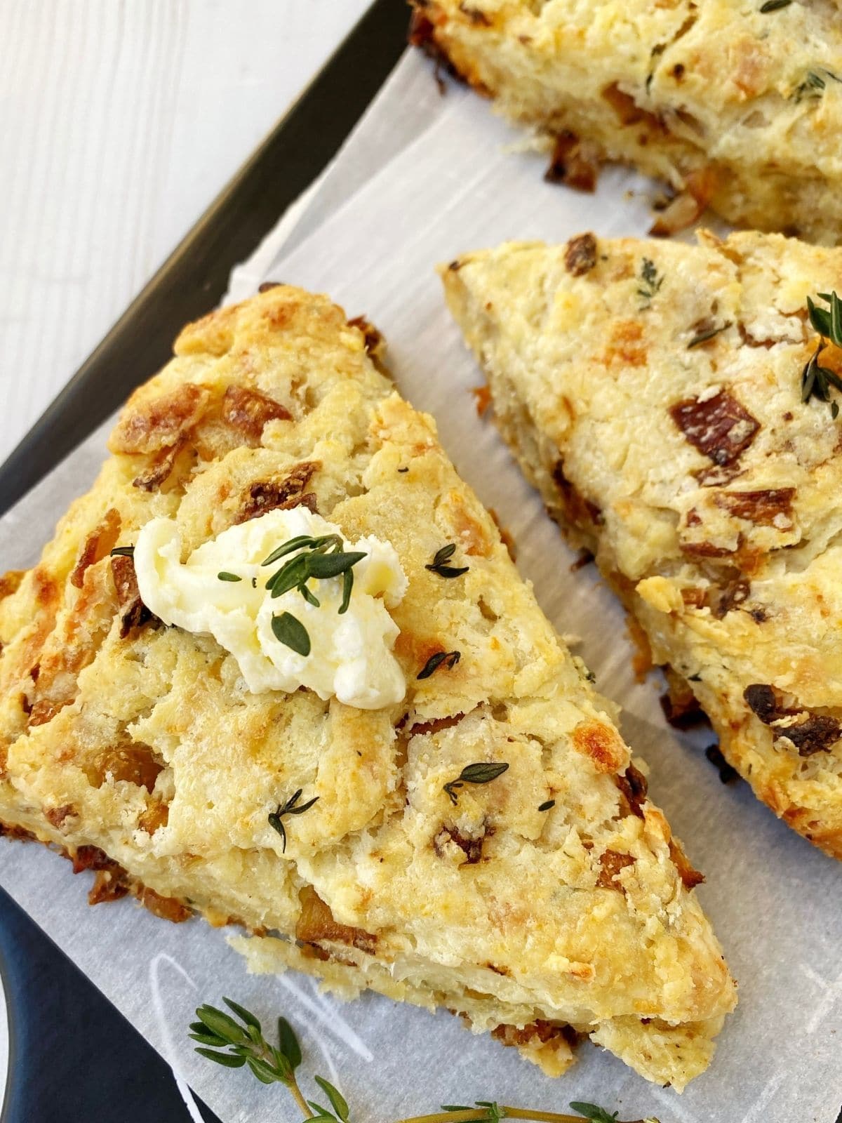 scone topped with thyme butter