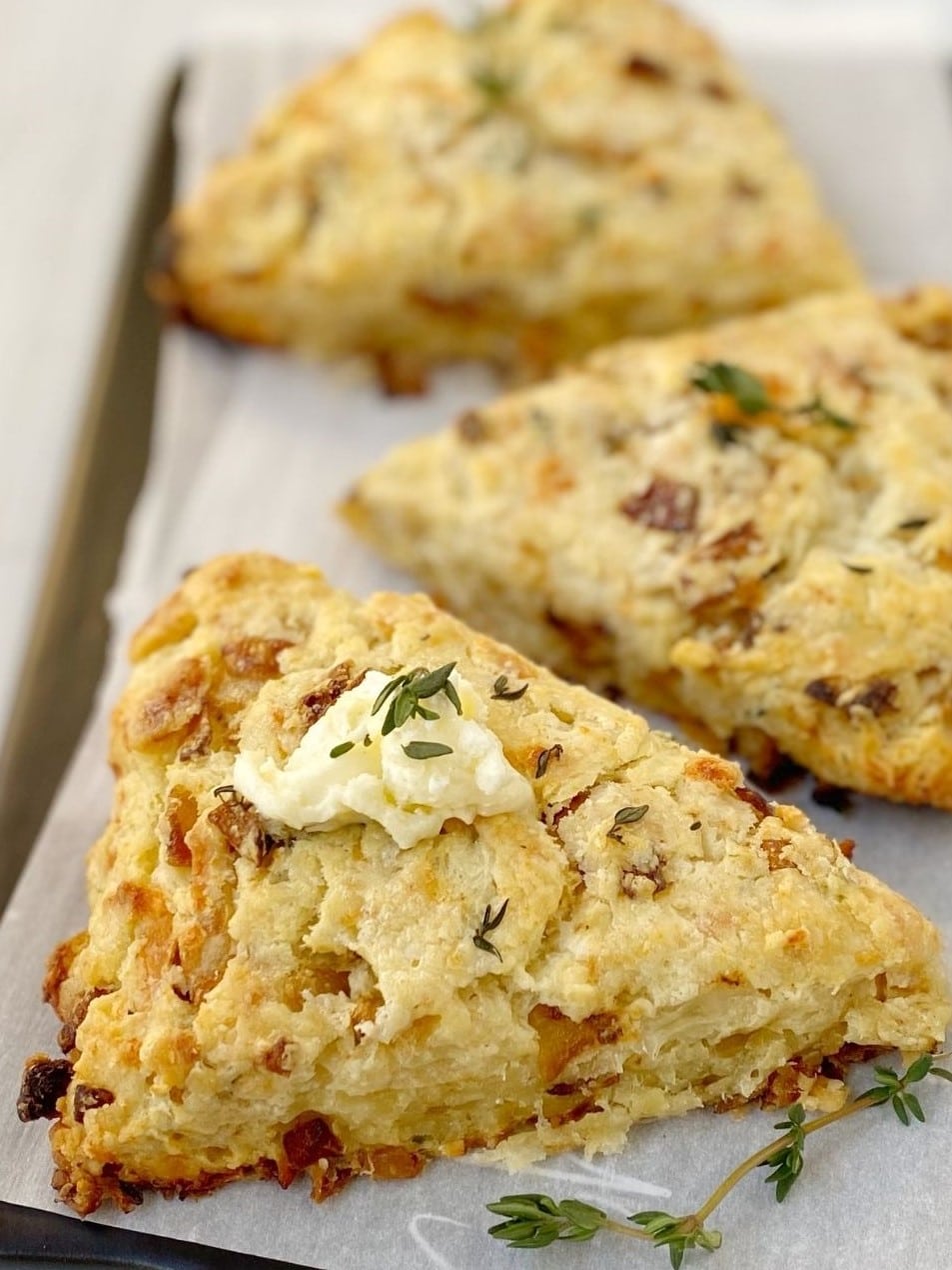 scones with thyme butter on top