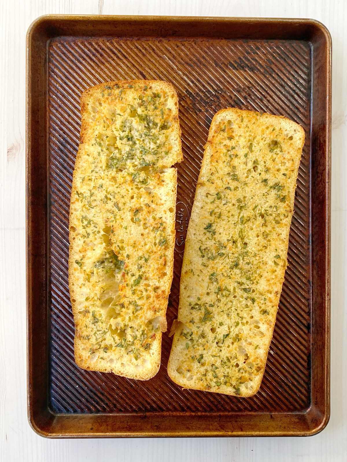 Baked bread on a sheet pan.