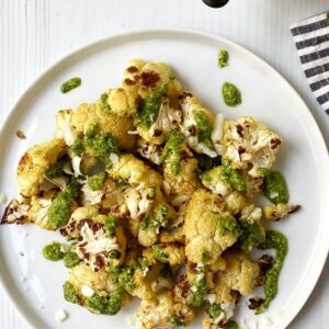 plate of roasted cauliflower with pesto