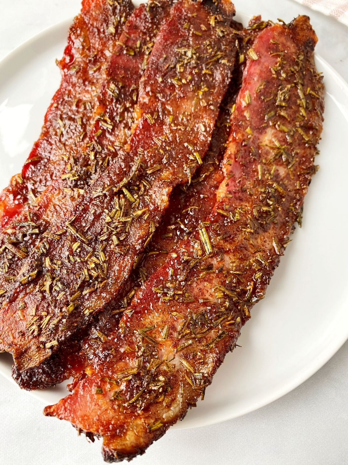 close up of oven-baked spiced bacon