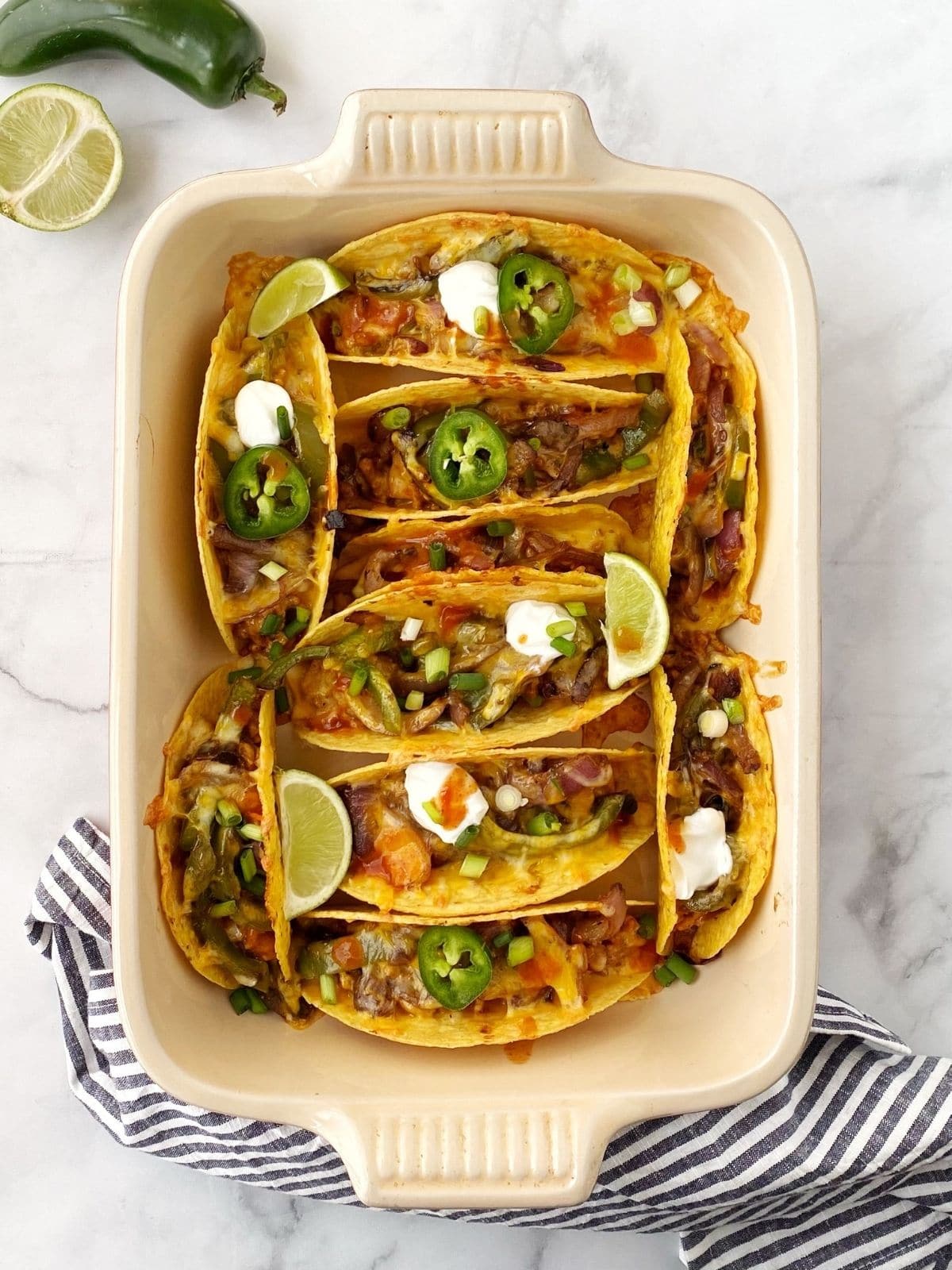 baking dish with chicken tacos