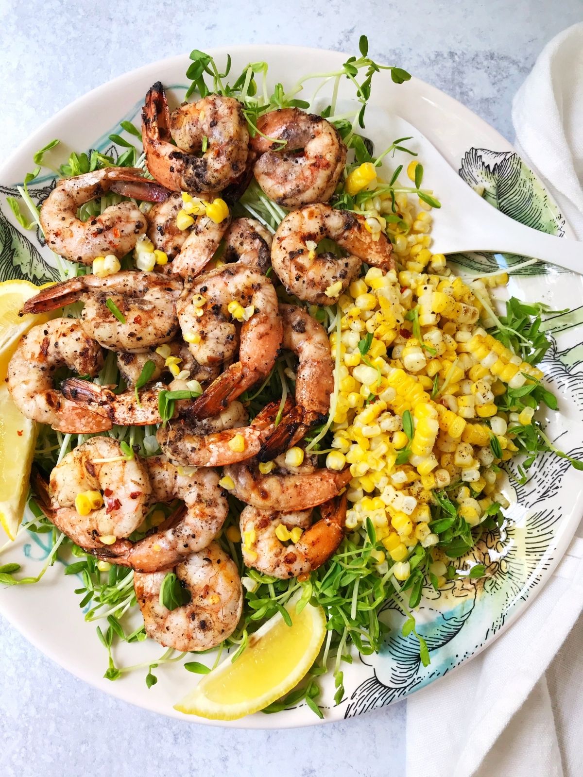 platter of shrimp and corn