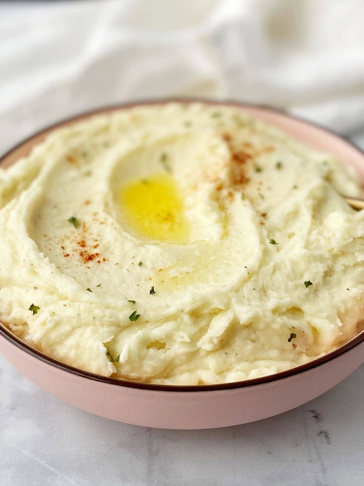 close up of bowl of mashed potatoes