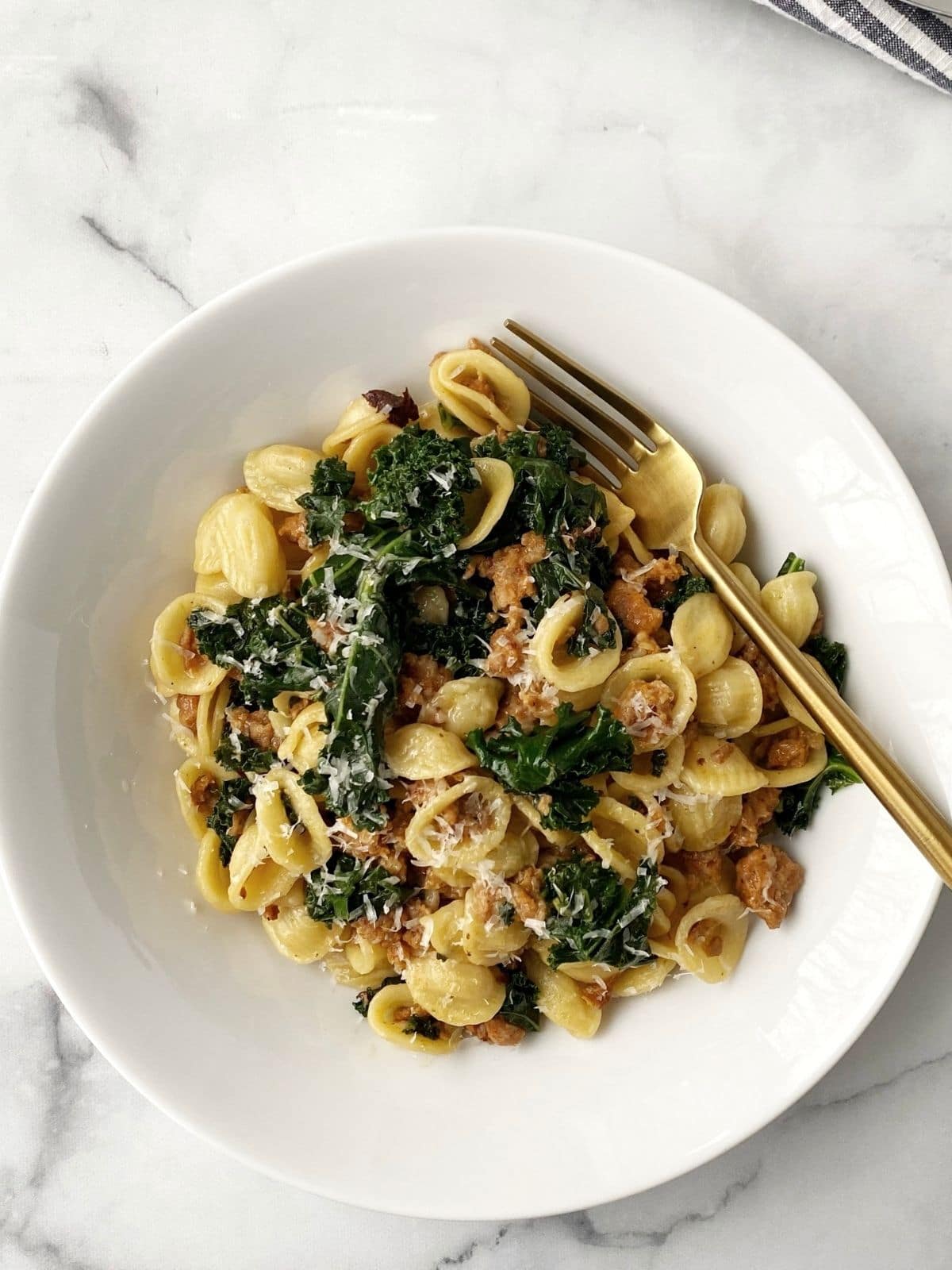 overhead of bowl of pasta with fork