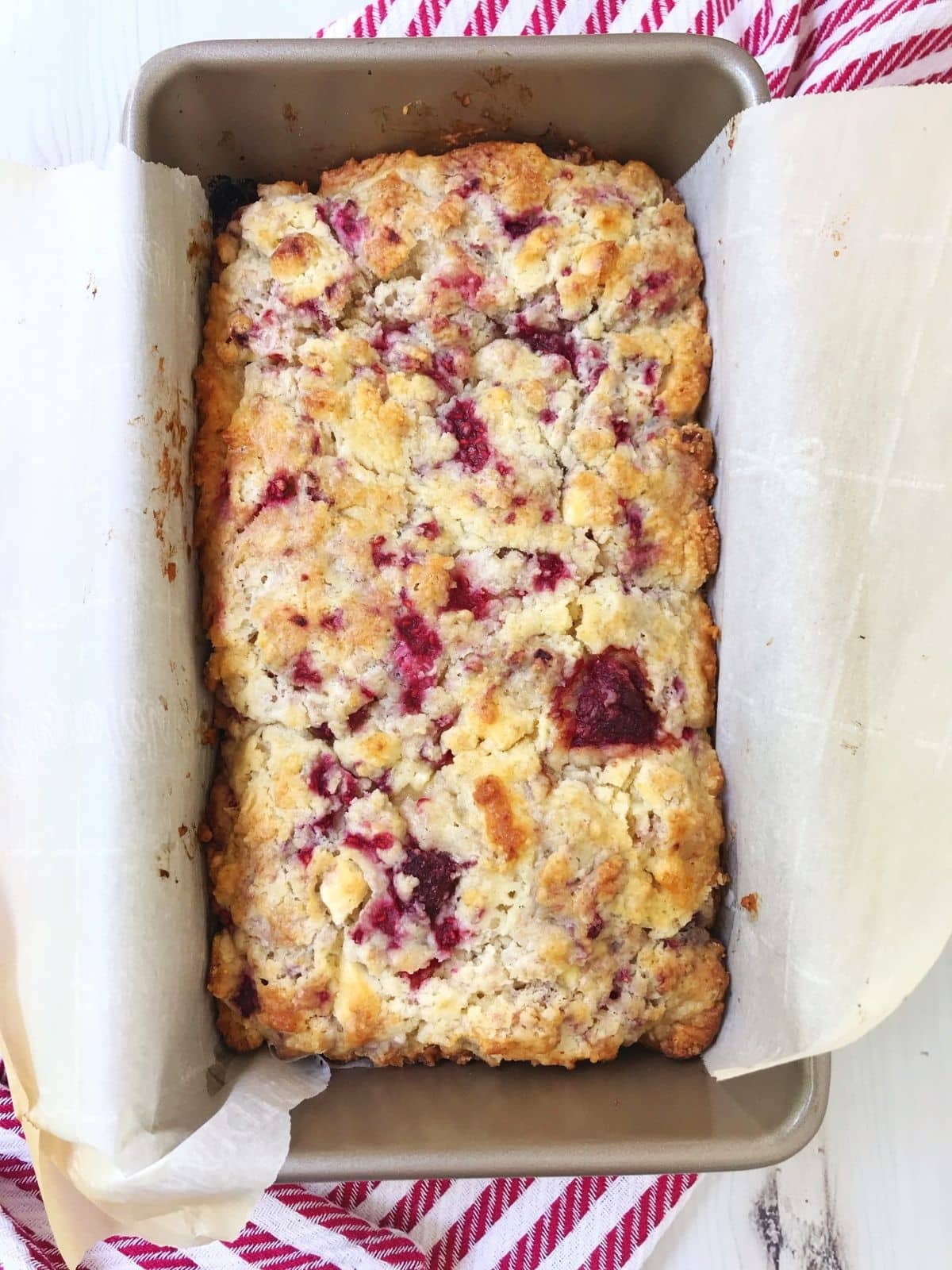 scone loaf in baking pan before adding glaze