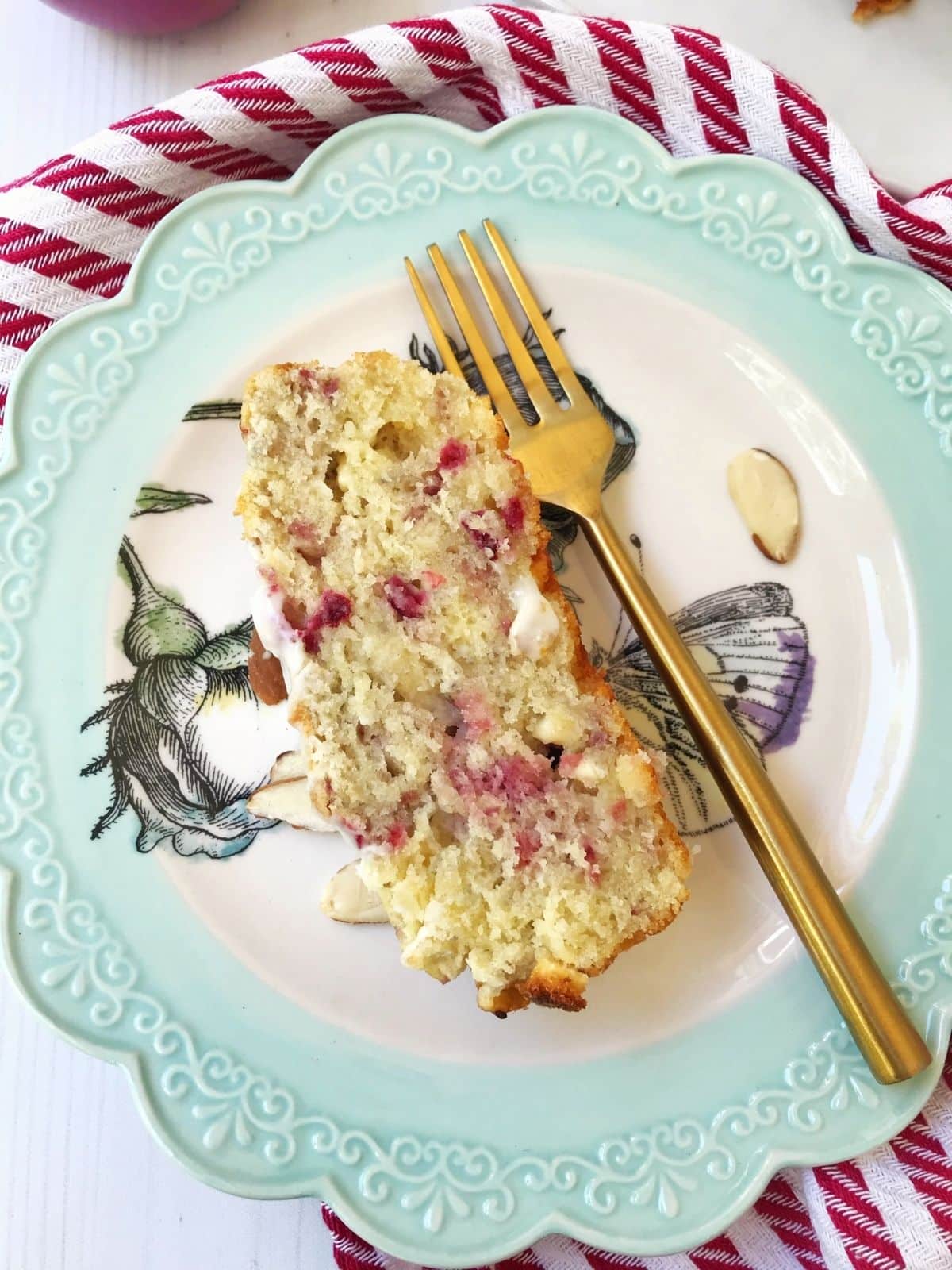 slice of scone loaf on a plate with a fork