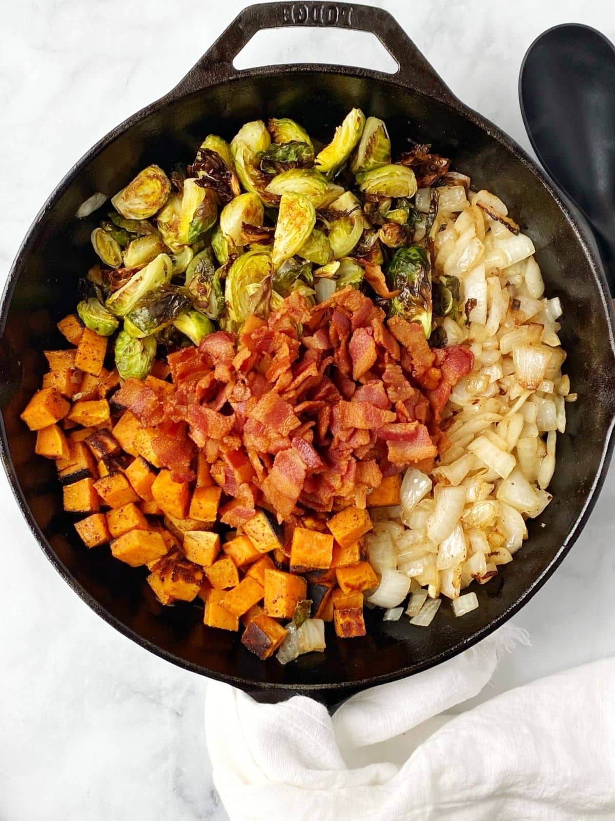 veggies and bacon in the skillet