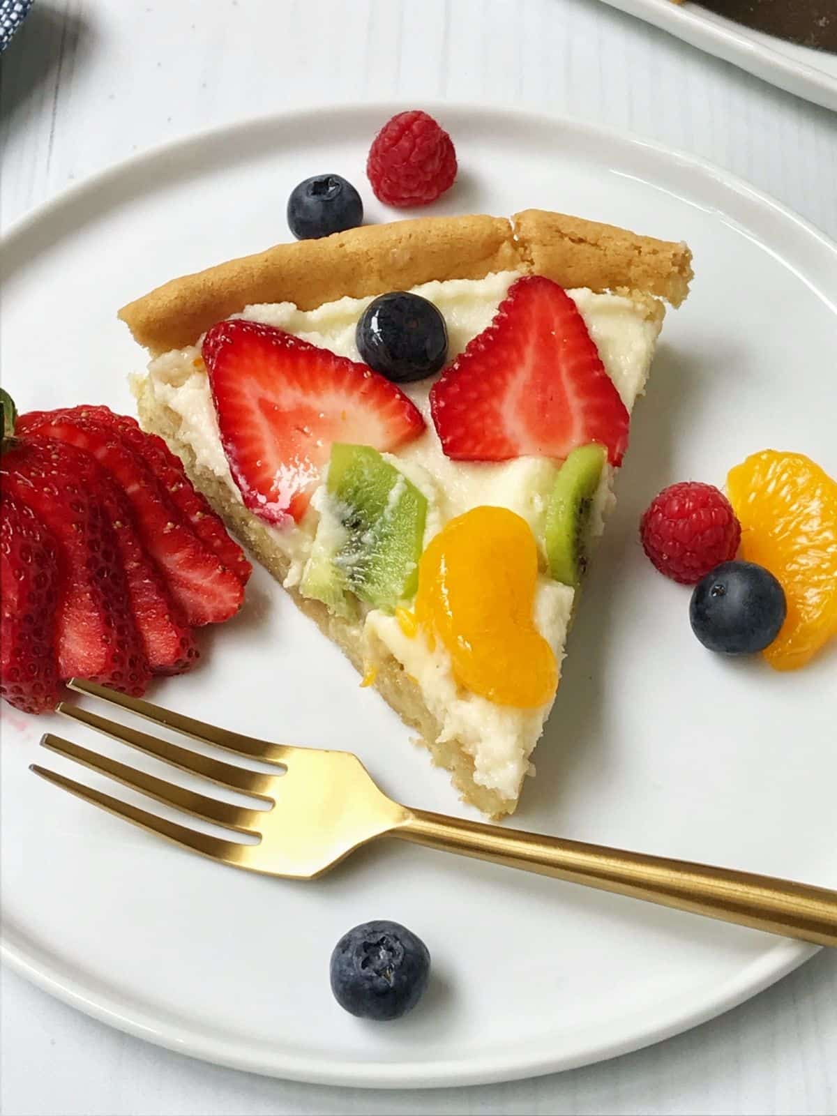 slice of fruit pizza on a plate