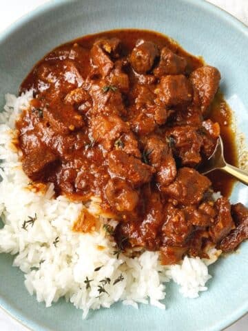 bowl of stew with rice