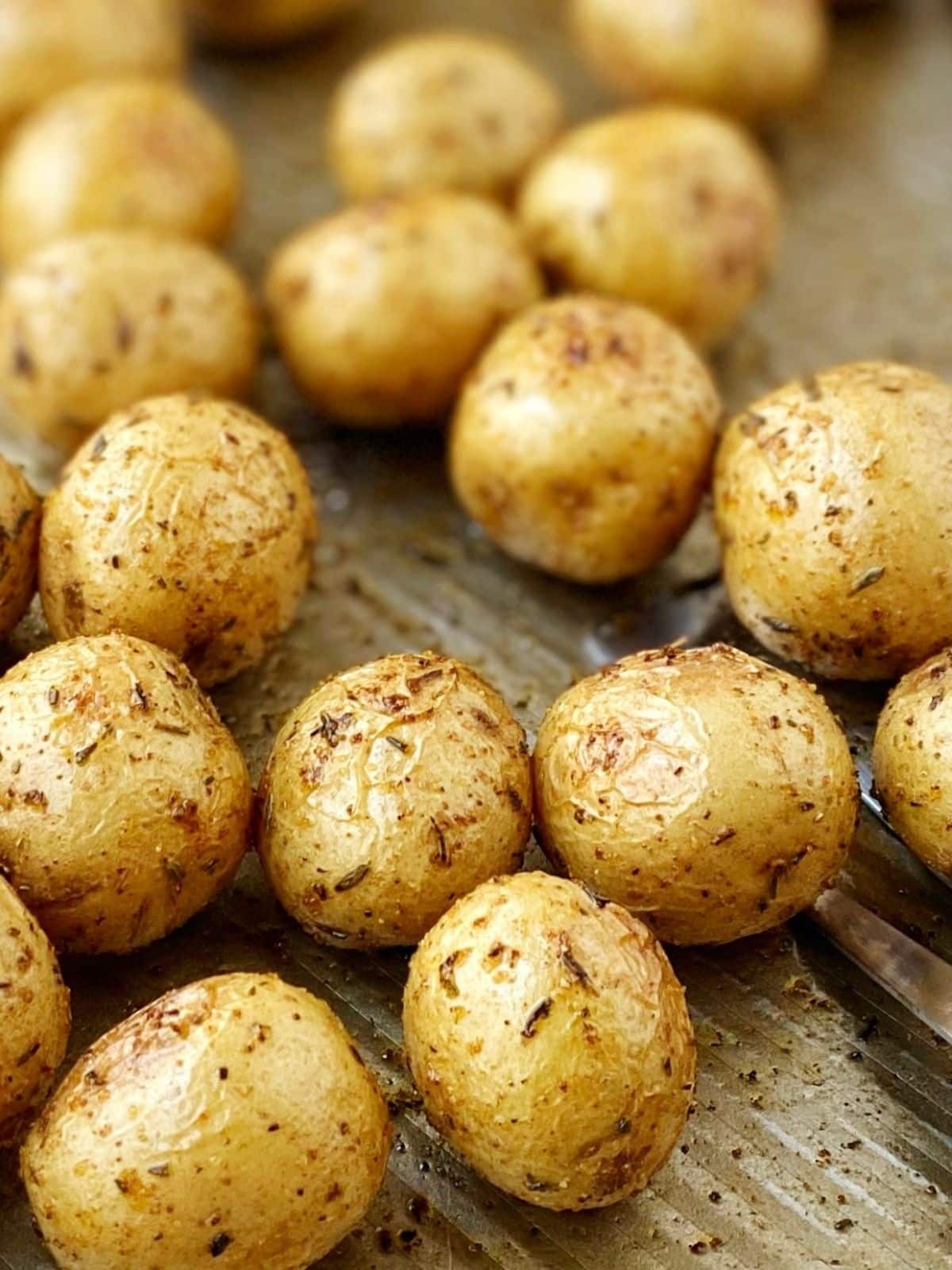 close up of potatoes on the sheet pan