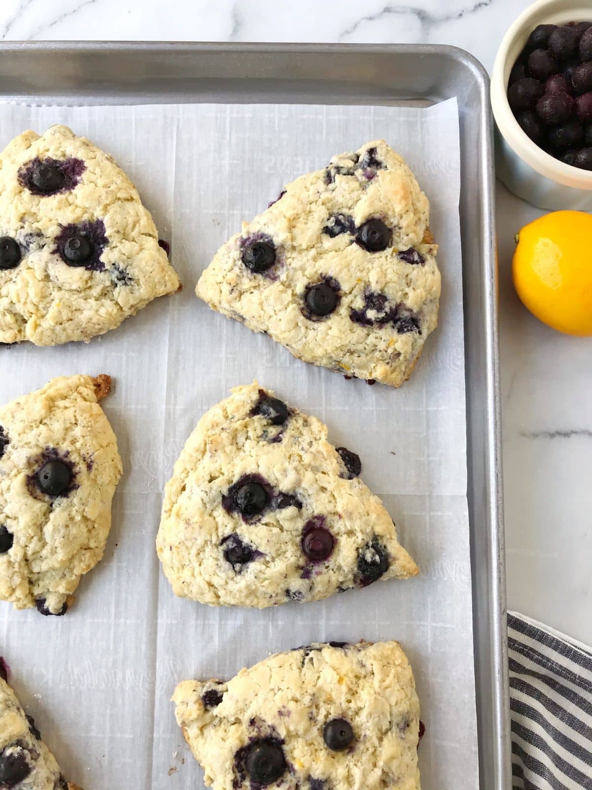 freshly baked scones on a sheet pan