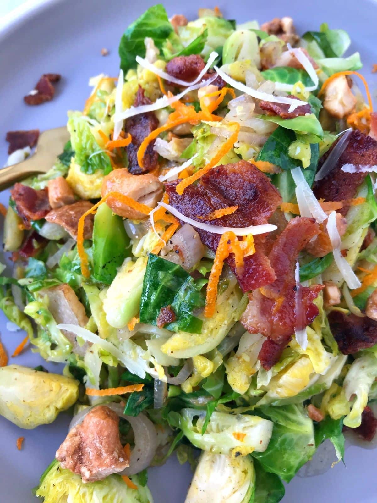 close up of salad garnished with parmesan