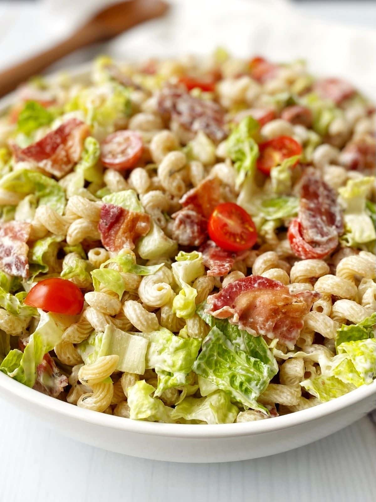 side close up view of bowl of pasta salad