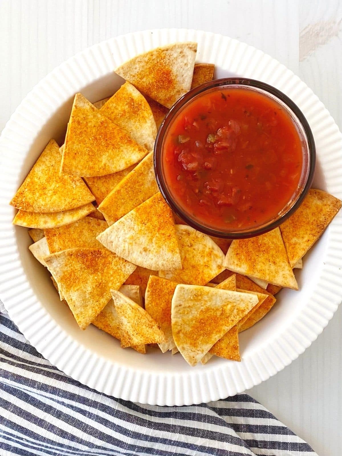 overhead of dish with chips and salsa