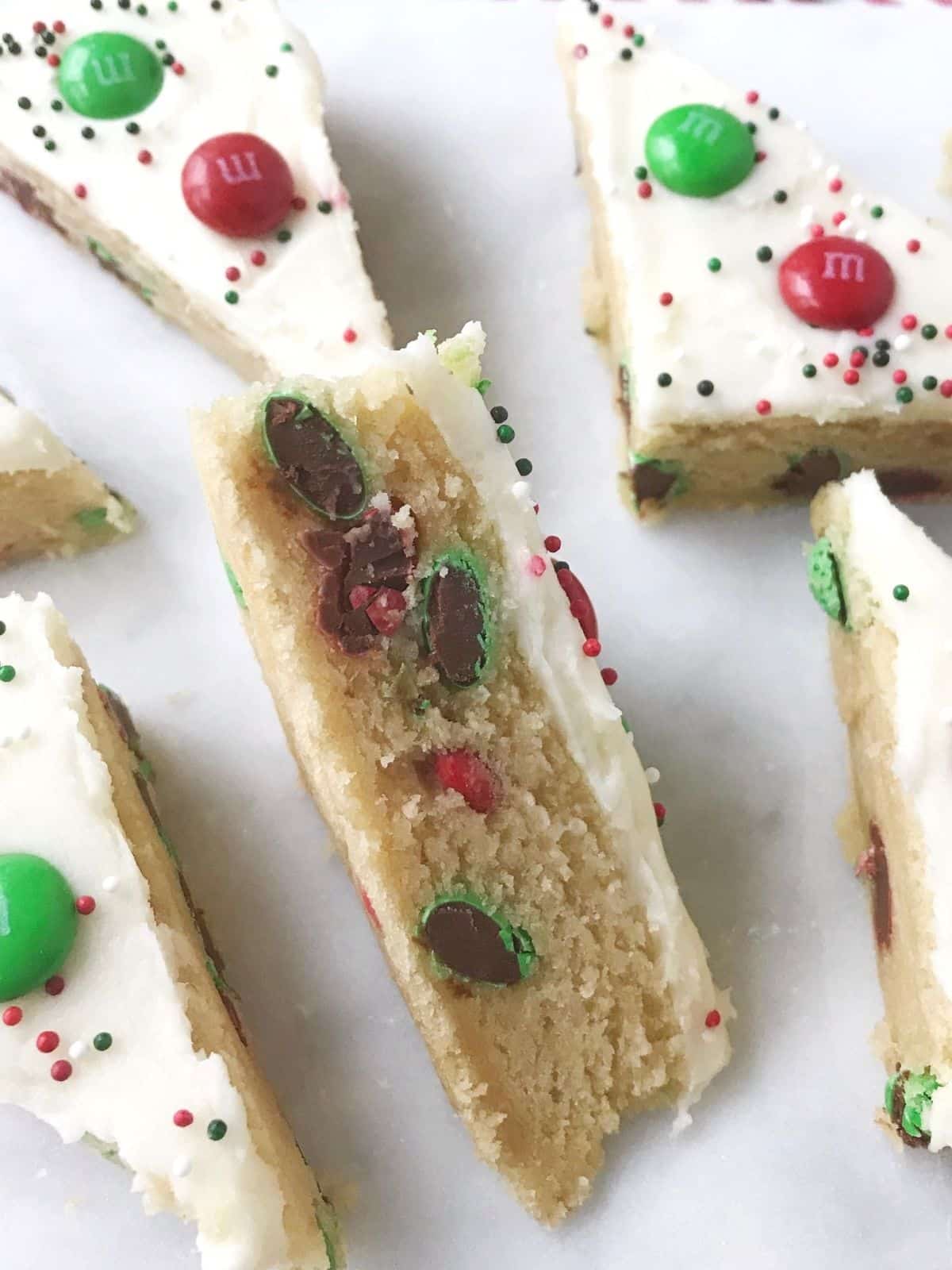 side view of chewy cookie bar on a platter