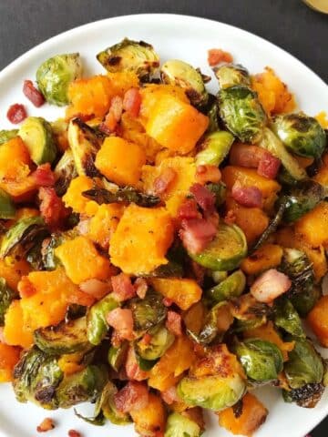 white serving plate wiht brussels sprouts