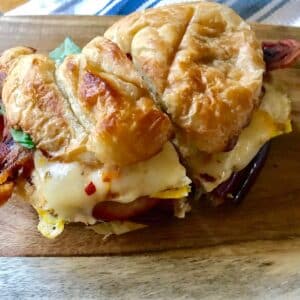 breakfast sandwich on a board.