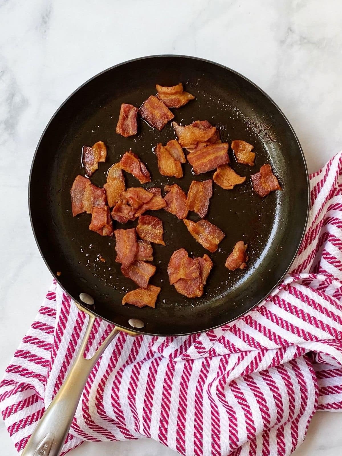 crisp bacon in skillet