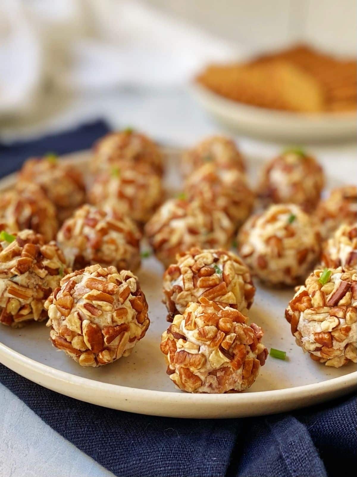 side view of cheese balls on a plate