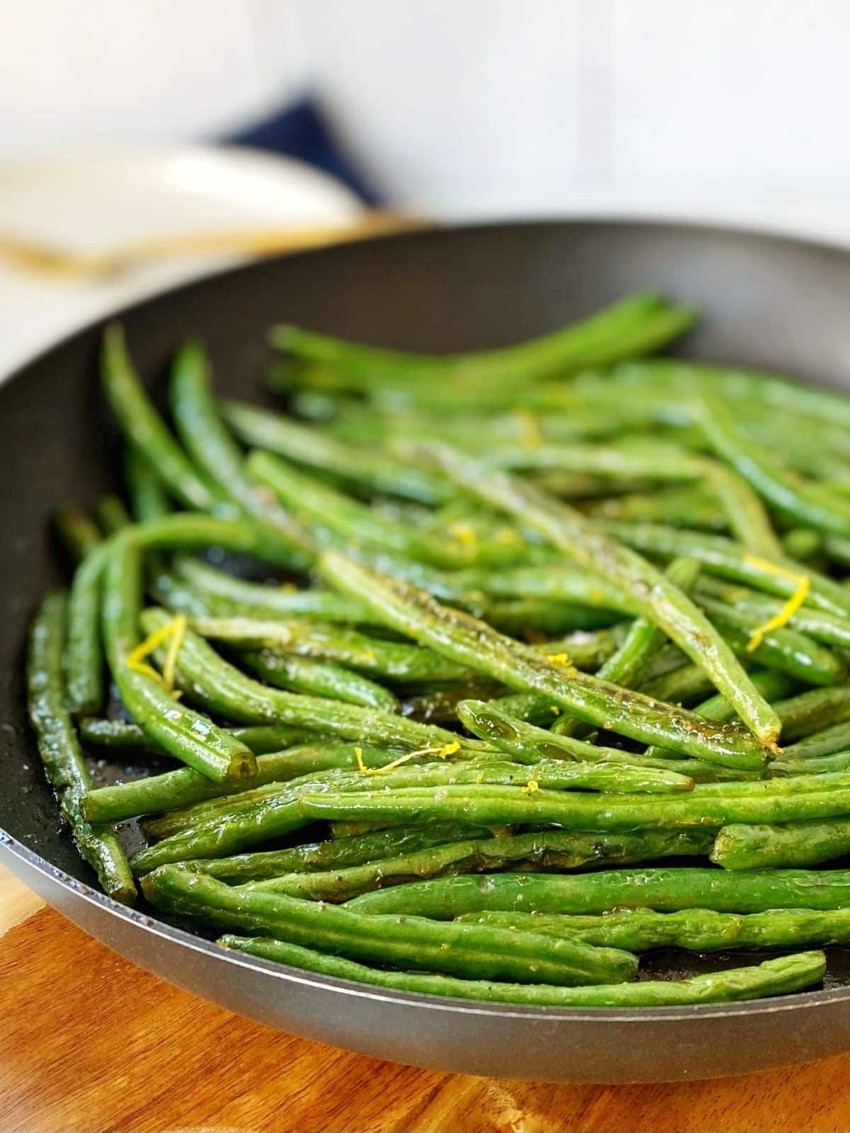 side view of green beans in skillet