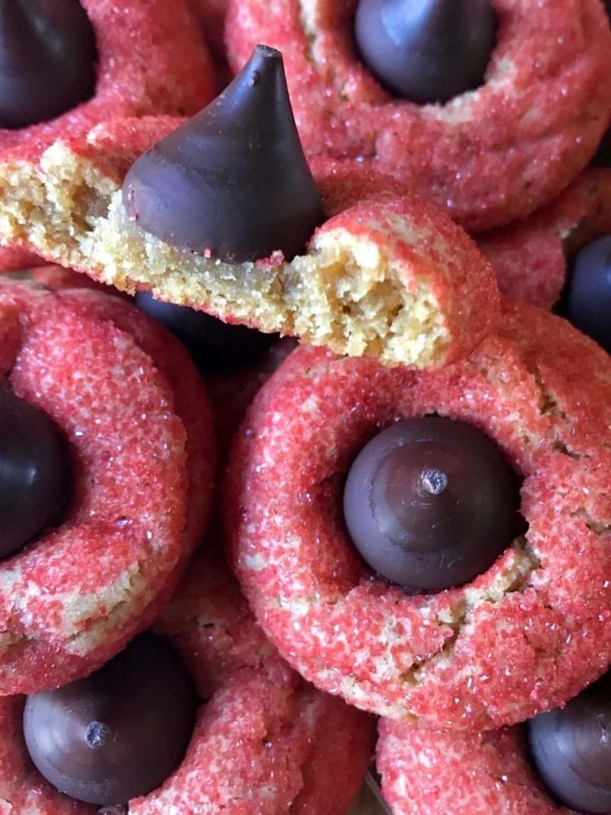peanut butter kiss cookies with red sugar.