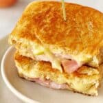 close up of Brie grilled cheese with ham and apple