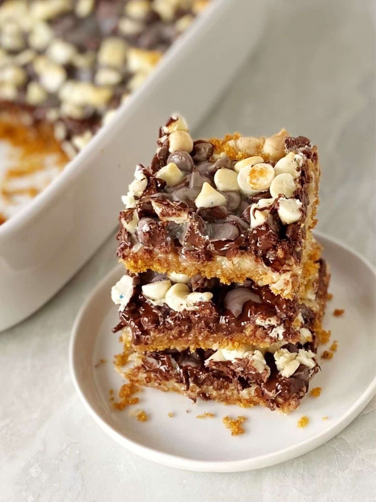 stack of magic cookie bars on a plate