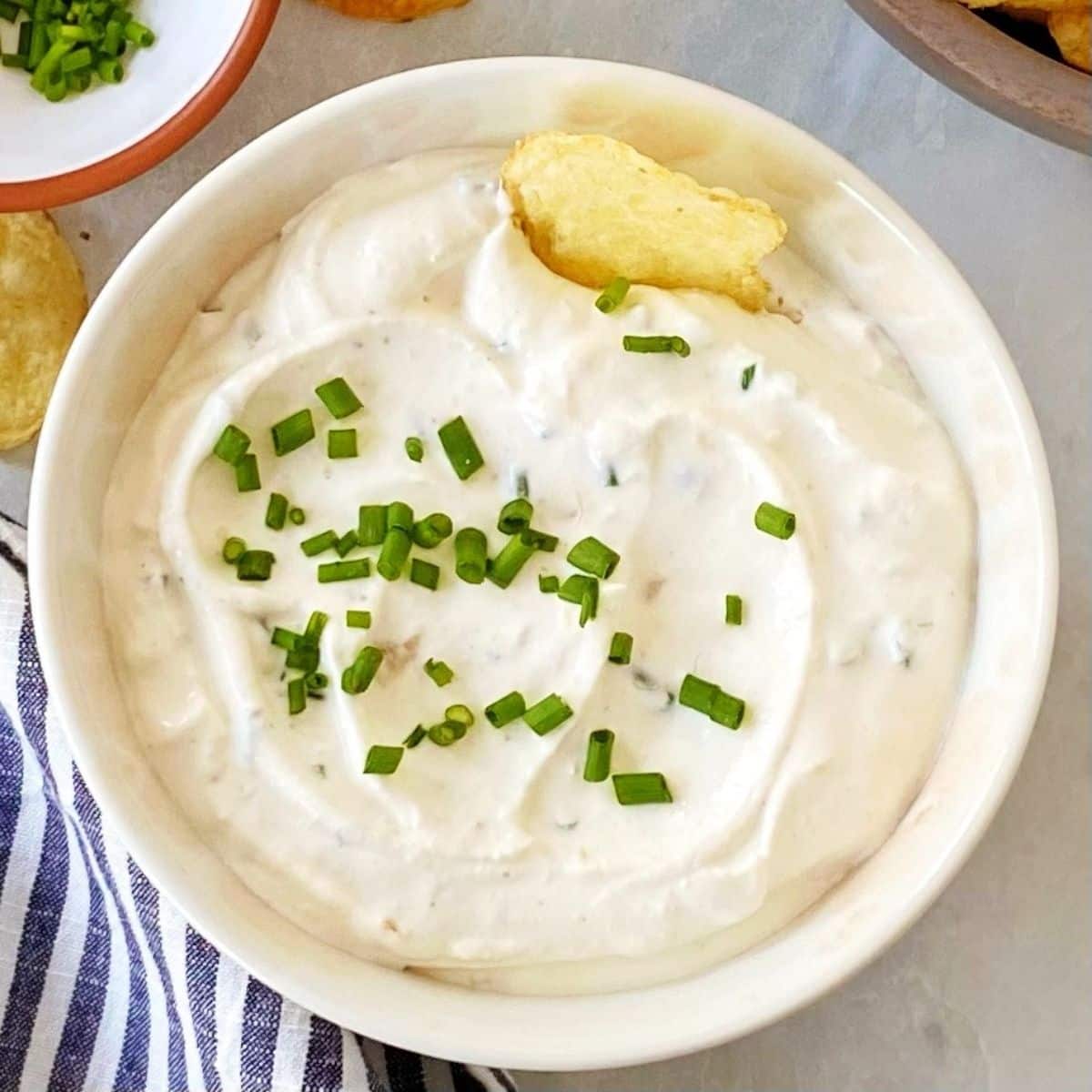 roasted garlic dip garnished with chives.