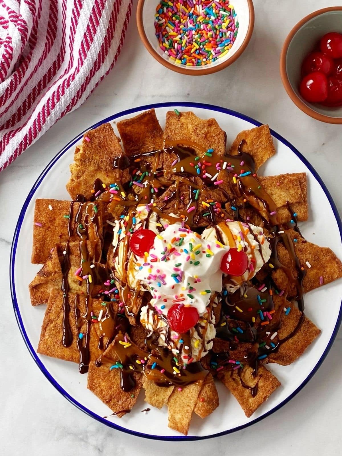 ice cream sundae nachos on a plate.