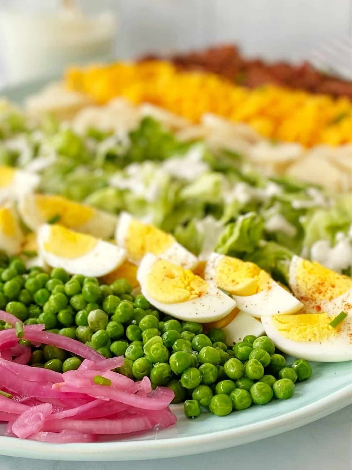 side view of salad arranged on a platter.