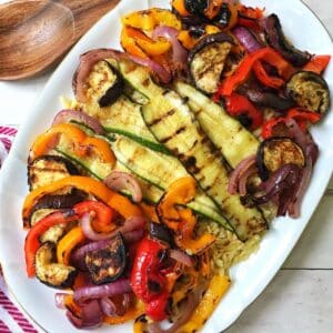 platter of grilled vegetables with lemon and orzo.