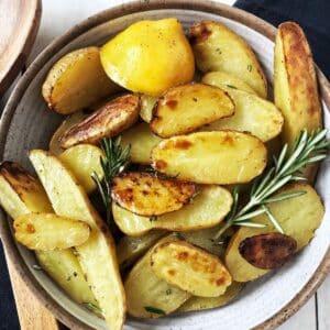 bowl of lemon rosemary roasted potatoes.