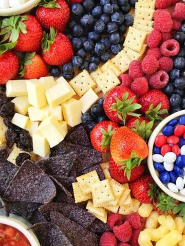 assorted patriotic snacks on a board.