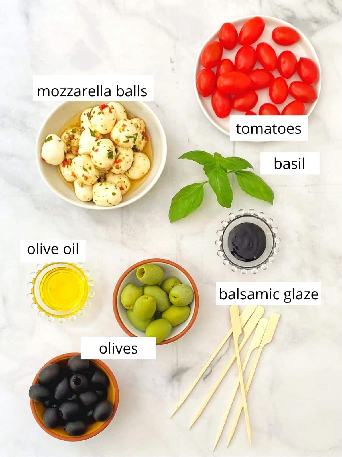 ingredients for olive caprese skewers.