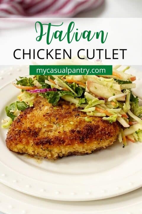 chicken cutlet with slaw on a plate.