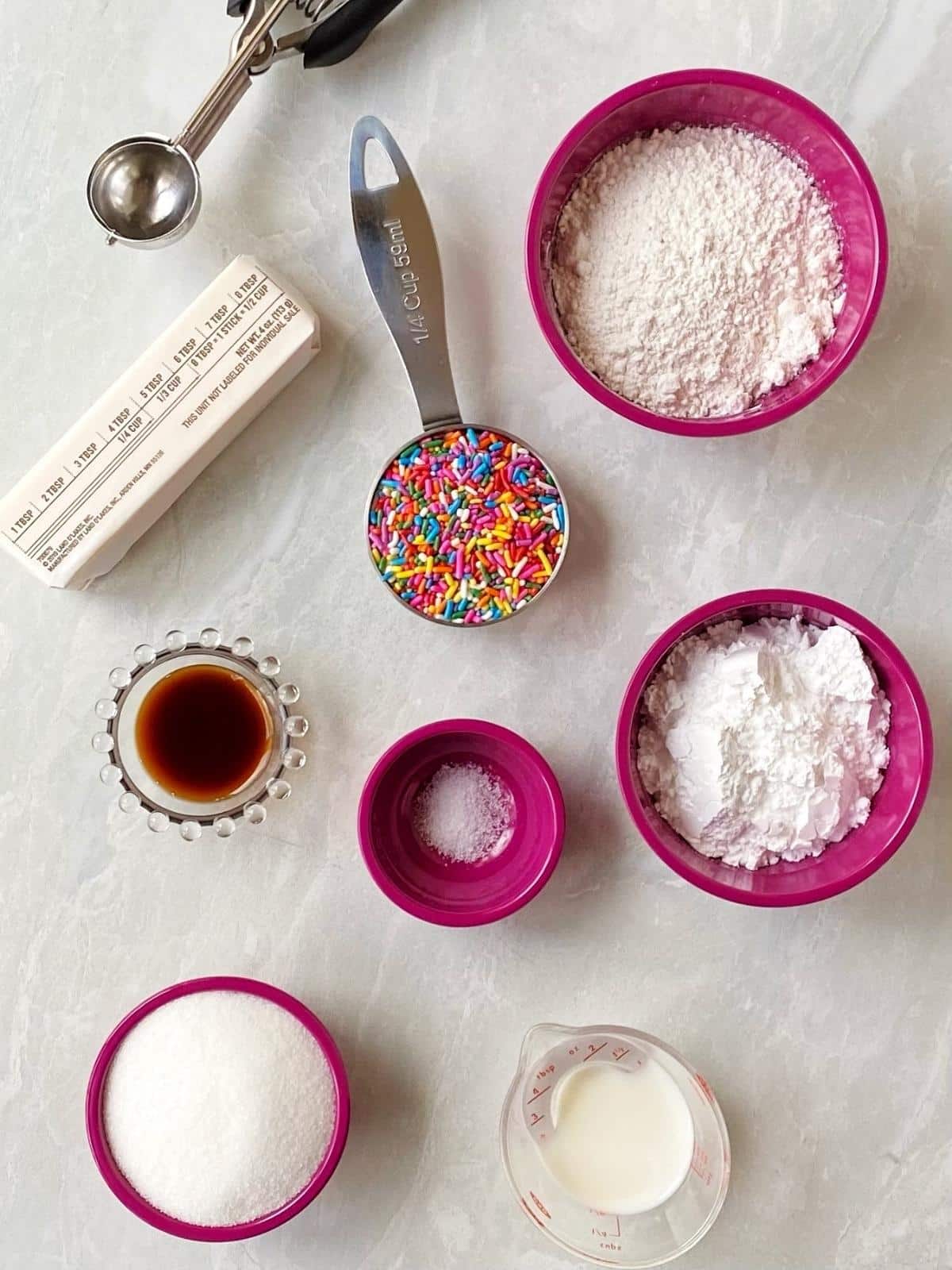 assorted measuring cups and spoons with ingredients.