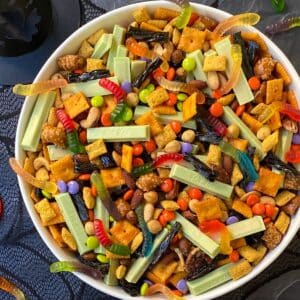 top down shot of white bowl of snack mix.