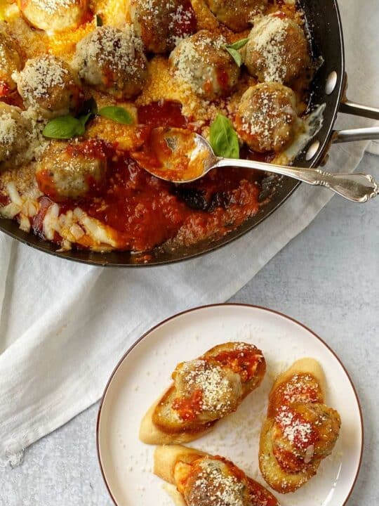 Chicken Parmesan Meatballs My Casual Pantry   Chicken Parm Meatballs Skillet Plated 540x720 