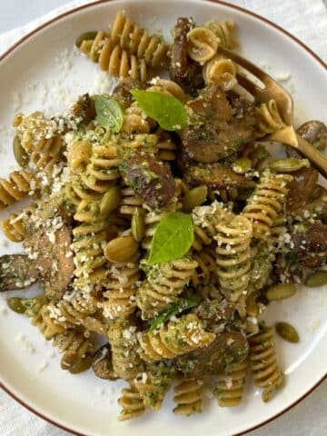 top down shot of mushroom pasta on a plate.