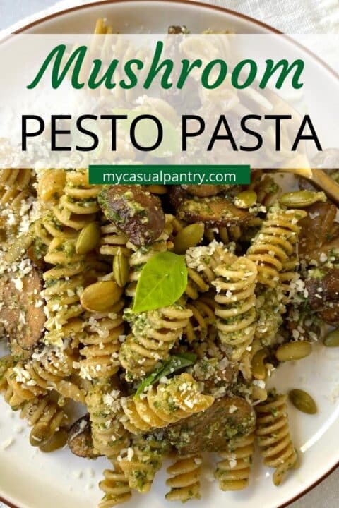 close up of plate of pesto pasta.