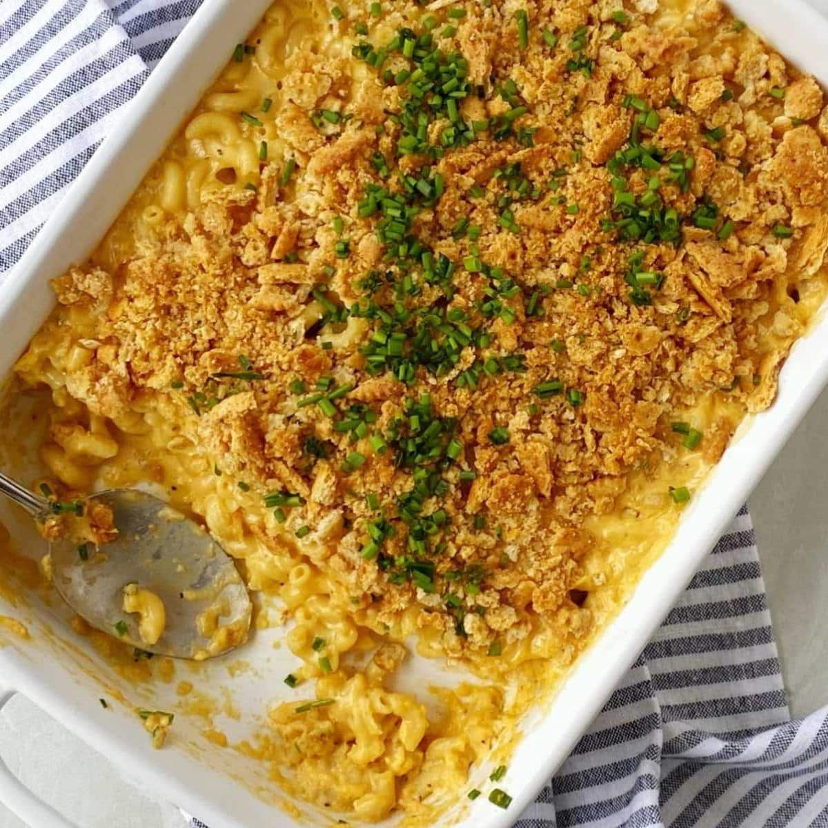 white casserole dish of baked mac and cheese.